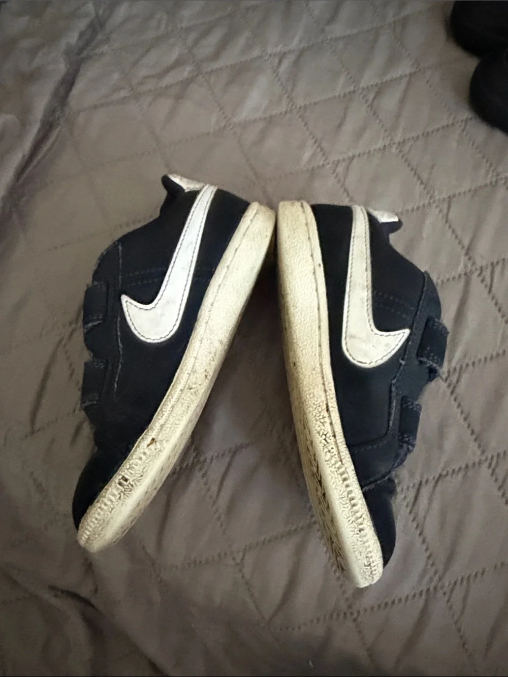 Nike Kids Black Sneakers with White Swoosh